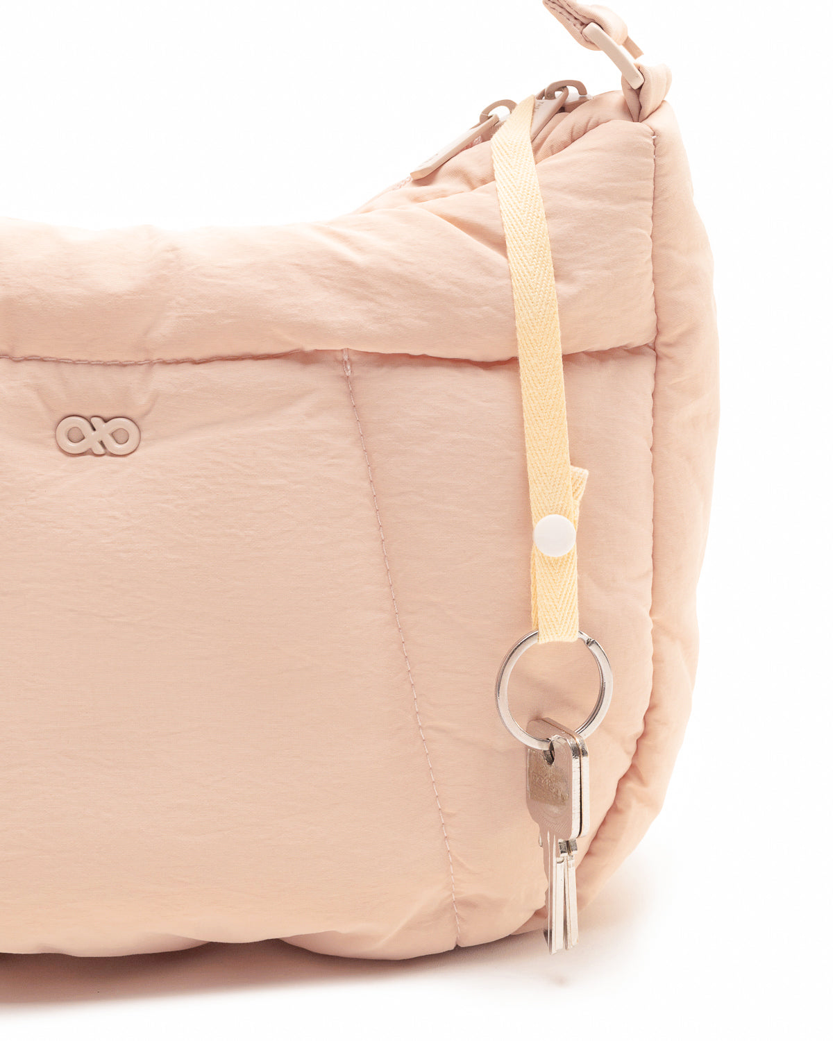 COSY PUFFY CROSSBODY BAG IN MELON