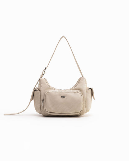 TATE POCKET HANDBAG IN SAND