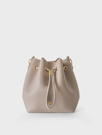 MINI REINA MAGIC BUCKET BAG IN TAUPE