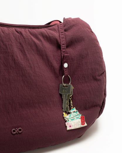 XL COSY PUFFY CROSSBODY BAG IN WINE